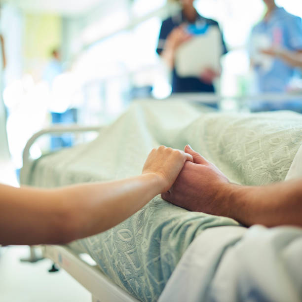 istock hospital visitor giving comfort 1299926327