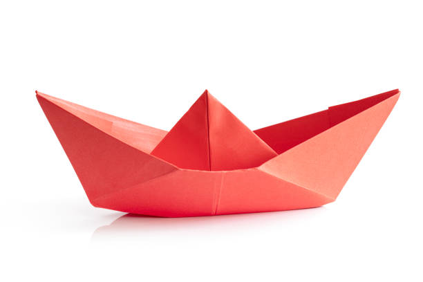istock Red Paper boat isolated on white background 1299926395