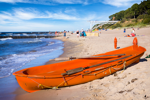 Holidays in Poland - Lifeguard's rescue boat on the beach in Trzesacz, west pomeranian voivodeship