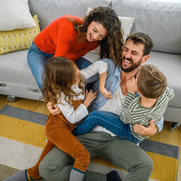 istock Happy family at home. 1299927870