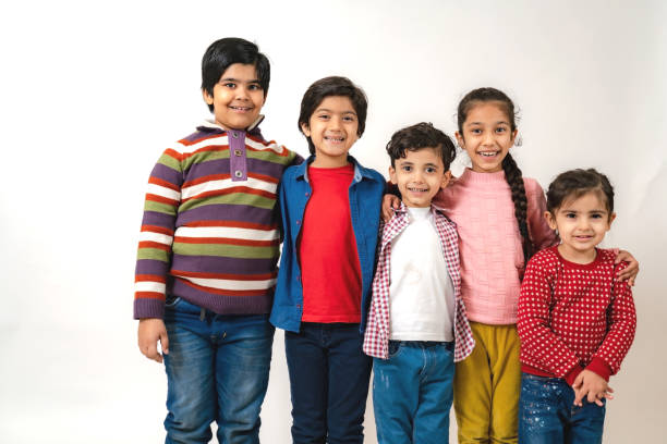 istock Group of children having fun in a studio 1299933512