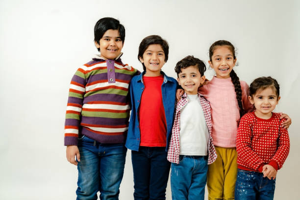 istock Group of children having fun in a studio 1299933548