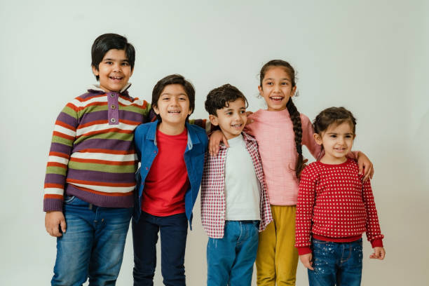 istock Group of children having fun in a studio 1299933550