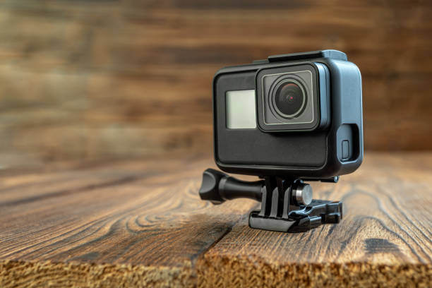 istock action camera on wooden background 1299936952
