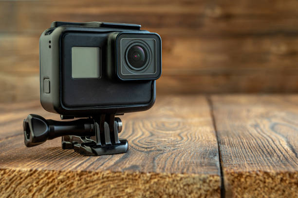 istock action camera on wooden background 1299936984