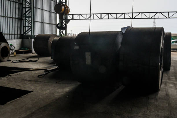 istock Steel coils inside a factory. 1299937125