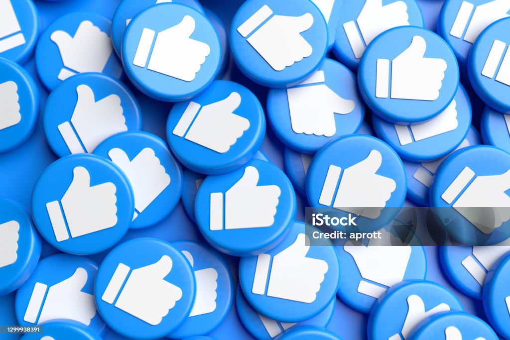 Many like buttons with white thumbs up on blue on a heap. Social Media Concept. Full frame. Social Media Stock Photo