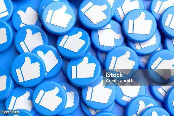 Many Like Buttons With White Thumbs Up On Blue On A Heap Social Media Concept Full Frame Stock Photo - Download Image Now