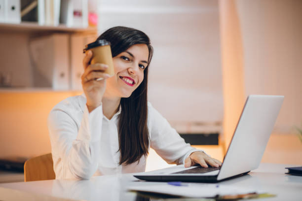 istock Businesswoman working in her office 1299940464