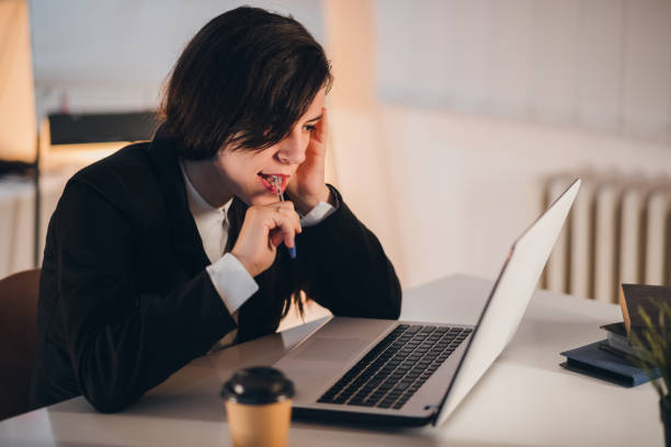 istock Businesswoman working in her office 1299940523