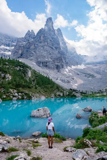 Beautiful Lake Sorapis Lago di Sorapis in Dolomites, popular travel destination in Italy. Blue green lake in Italian Dolomites