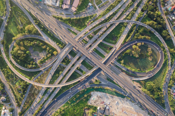 istock Aerial view of road interchange or highway intersection 1299942246
