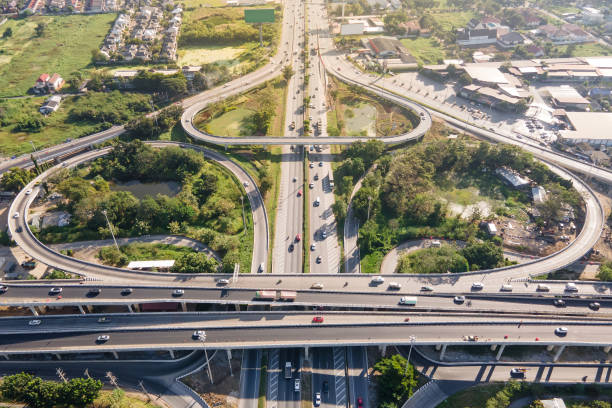istock Aerial view of road interchange or highway intersection 1299942262