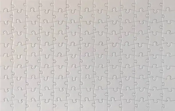 Photo of Close-up of blank white jigsaw puzzle texture background