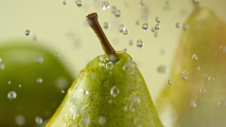 SLO MO LD Water falling onto a pear