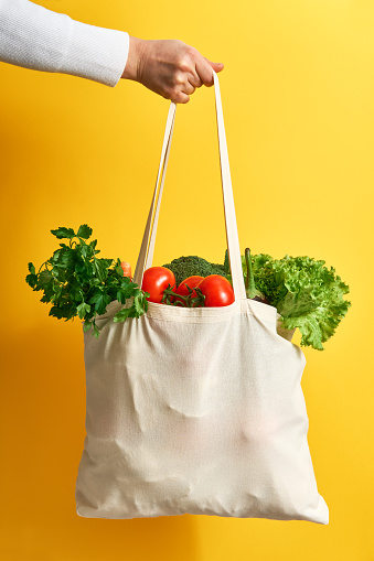 Reusable shopping bag with fresh vegetables