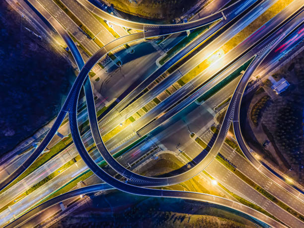 istock Aerial view highway road at night 1299950644