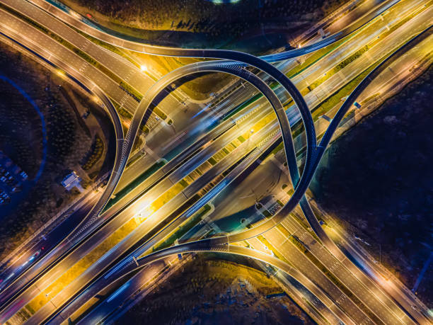 istock Aerial view highway road at night 1299951222