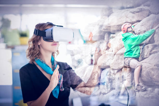 istock Composite image of female executive wearing virtual reality headset 1299951790