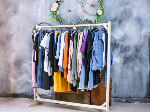 istock Mobile clothes hanger on a wall background 1299955530
