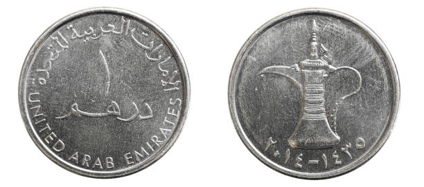 istock one United Arab Emirates dirham coin on a white background 1299955668