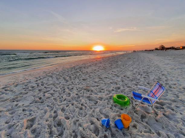 istock Relaxing sunset on the beach sand 1299960397