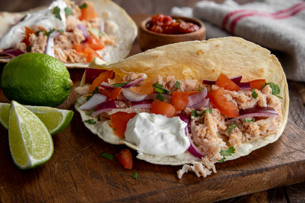 istock Chicken Tacos With Tomato, Onion and Sour Cream 1299962156