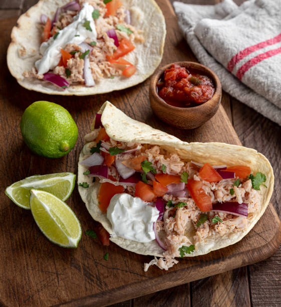istock Chicken Tacos With Tomato, Onion and Sour Cream 1299962159