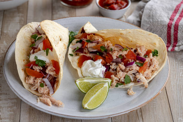 istock Chicken Tacos With Tomato, Onion and Sour Cream 1299962183