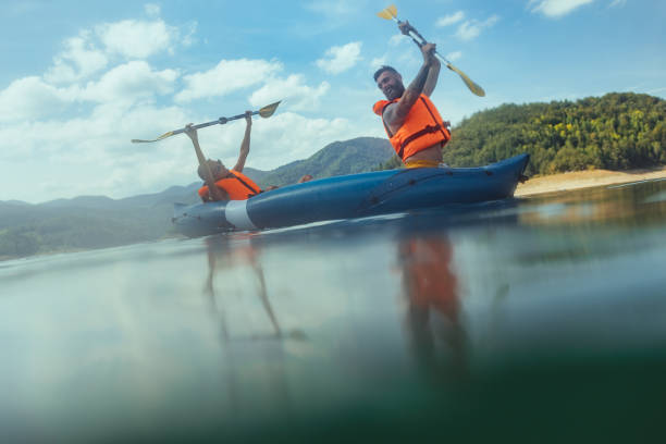istock Two people in kayak on the river 1299967264