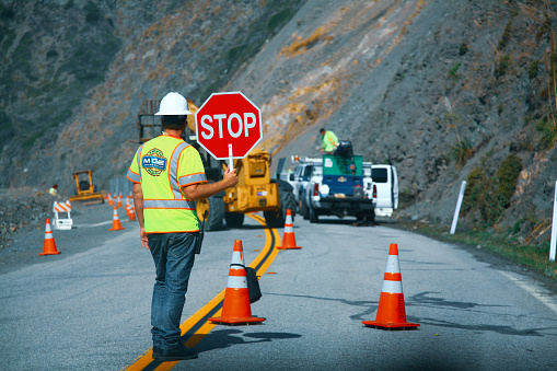 Highway #1 , California, USA - Octobre, 11, 2011: Road workers repairing the Highway #1