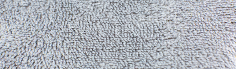 Grey cotton towel or carpet\