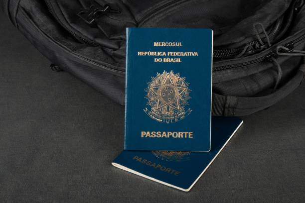 istock Brazilian passport on gray background with copy space 1299968660