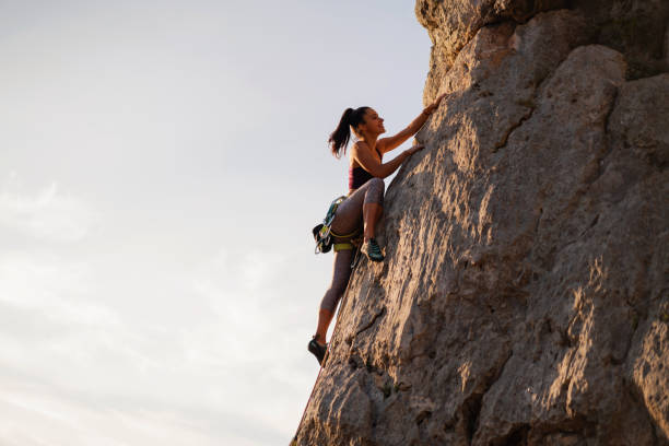 istock Side view of a female climber 1299970428