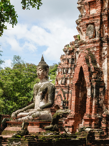 Ancient brick stupas and pagodas and Buddha. Ayutthaya, Thailand