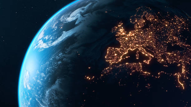 planète terre la nuit - les lumières de la ville de l’europe brillent dans l’obscurité - global finance globe global communications map photos et images de collection