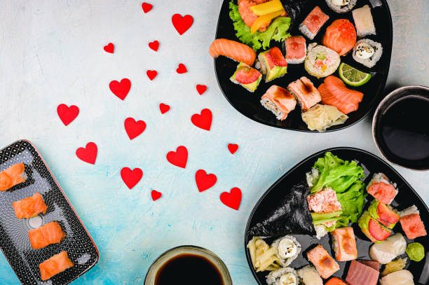 istock St valentines day greeting card with sushi rolls. 1299973223