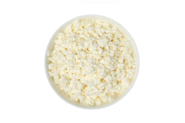 istock Bowl with cottage cheese isolated on white background 1299973300