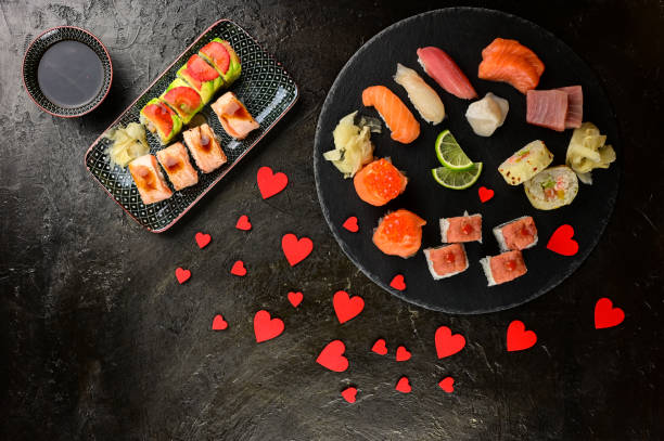istock St valentines day greeting card with sushi rolls. 1299973341