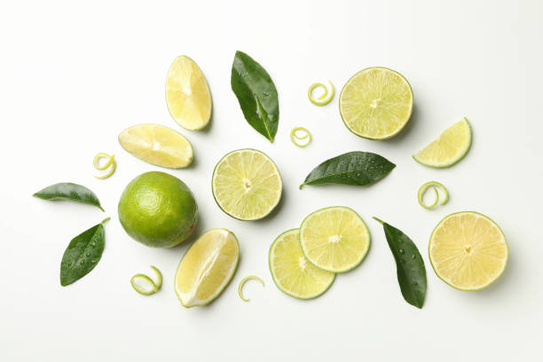 istock Flat lay with ripe lime on white background 1299974392