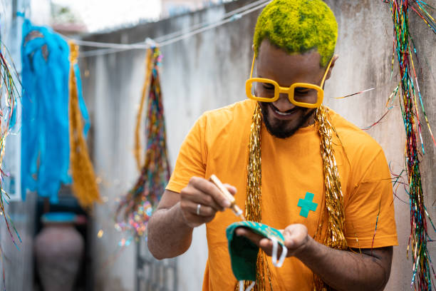 istock Painting the mask for Carnival 1299976048