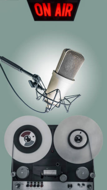 istock professional microphone, tape recorder and on air sign 1299980753