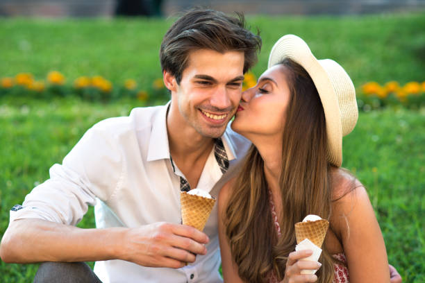 istock Young couple eating ice cream in summer 1299980923