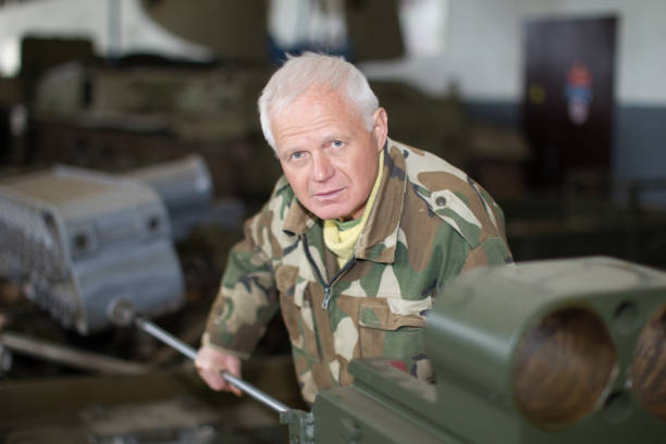 istock Military worker repairing tanks 1299982696