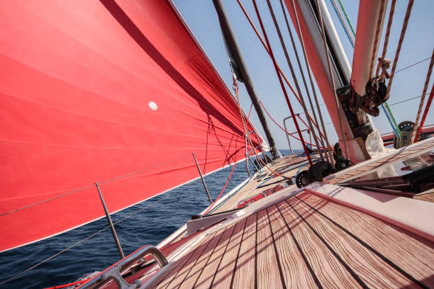Wooden deck of the sailing yacht.
