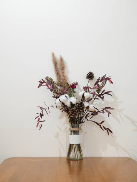 istock A vase of blooming flowers sits on a table in the interior 1299985848