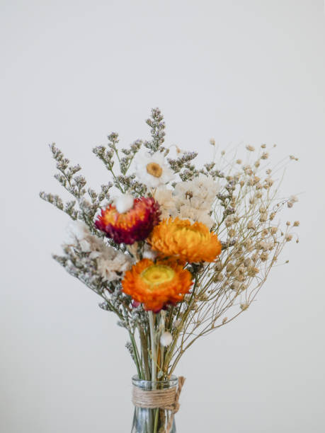 istock A vase of blooming flowers sits on a table in the interior 1299986136