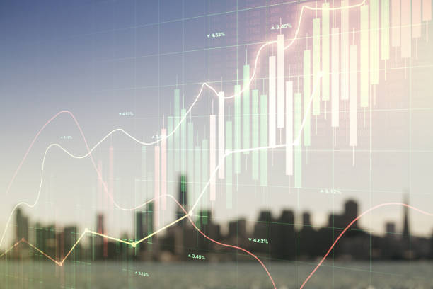 istock Multi exposure of virtual abstract financial graph interface on blurry skyscrapers background, financial and trading concept 1299992368