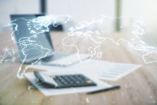 istock Multi exposure of abstract graphic world map hologram on calculator and pc background, connection and communication concept 1299992381