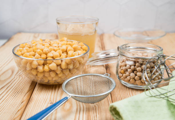 istock Source of vegetable protein Aquafaba decoction of chickpeas. Alternative to using chicken eggs 1299997136